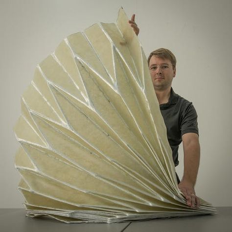 Joseph Choma demonstrates his nifty paperfolding technique for fiberglass | News | Archinect Folding Architecture, Florida Atlantic University, Folding Structure, Architect Student, Architecture Program, Unique Night Lights, Recycled Art Projects, Origami And Kirigami, School Of Architecture