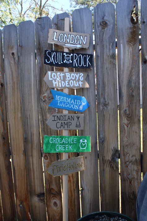 I just used card board for the signs and paint! Direction Sign, Peter Pan Party, Mermaid Lagoon, Directional Signs, Trunk Or Treat, Peter Pan, Trunk, Nursery