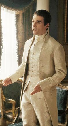 A candid photo of a royal family member experiencing a fashion faux pas, such as a wardrobe malfunction or mismatched outfit, caught during a public appearance. Bridgerton Groom Suit, Bridgerton Party Outfit Men, Bridgerton Mens Outfits, Bridgerton Suit, Regency Era Fashion Men, Regency Suit, Bridgerton Men, Mismatched Outfits, Steampunk Male