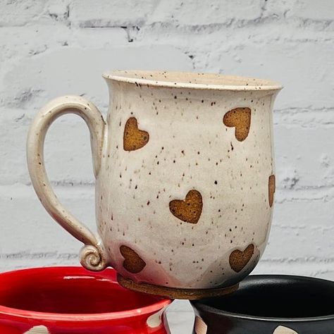 Paula Clegg on Instagram: "Check out these cute heart mugs I just unloaded from the kiln! Which color is your favorite?! These will be available in my February Restock. (Date is still TBD) #pottery #valentinesdaygift" Valentines Day Ceramics Ideas, Valentines Pottery Ideas, Valentine Pottery Ideas, Valentines Day Pottery, Valentines Ceramics, Valentines Pottery, Valentine Pottery, Potters Hands, Glaze Techniques