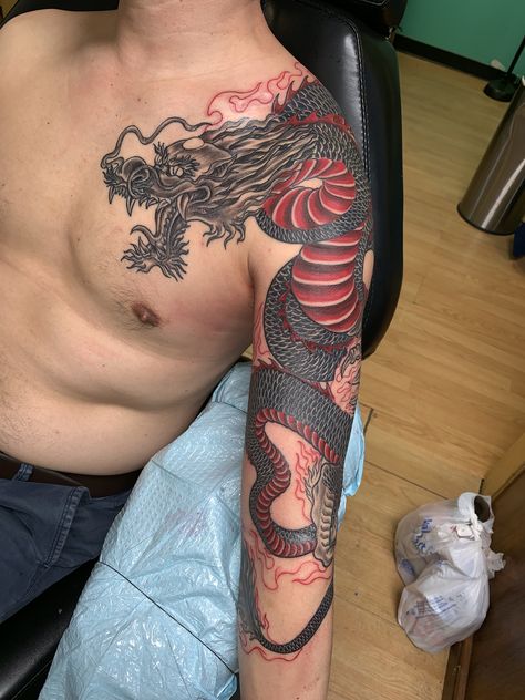 Dragon Chest Arm Tattoo, Huge Dragon Tattoo, Arm Dragon Tattoo Men, Dragon Tattoo Chest Men, Japanese Dragon Shoulder Tattoo, Fire Chest Tattoo, Red Ink Chest Tattoo, Simple Chest Tattoo Men, Lion Dragon Tattoo