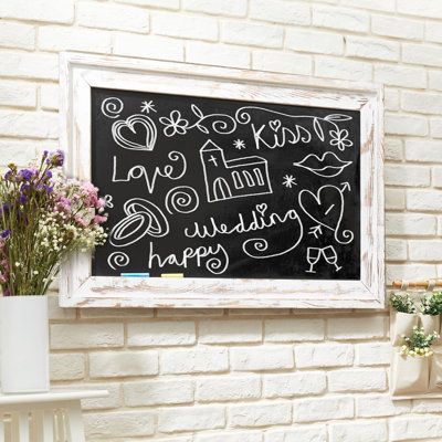 Featuring a writing surface suitable for dry chalk, this decorative vintage-looking chalkboard offers versatility for both text and vibrant displays. The vintage look complements a variety of country, vintage, and industrial decors. It can even be displayed horizontally or vertically to create optimal chalkboard space. Providing a large canvas for everything from artwork to extensive menus to schedules, this rustic, white wood-framed blackboard makes a useful and attractive addition to a variety Writing Recipes, Hanging Chalkboard Sign, Hanging Chalkboard, Liquid Chalk Markers, Liquid Chalk, Vintage Inspired Decor, Framed Chalkboard, Whitewash Wood, Chalkboard Sign