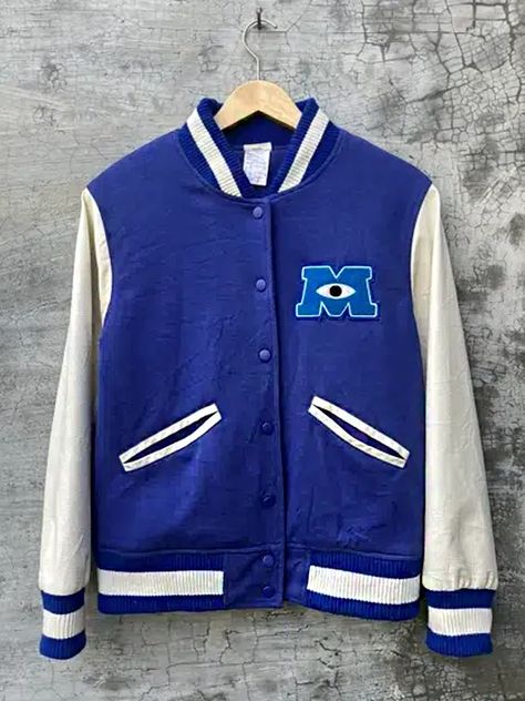 University Jacket, Jacket Drawing, Mike Wazowski, Monsters University, Character And Setting, Varsity Jacket Men, University Logo, Monster University, Men's Leather Jacket