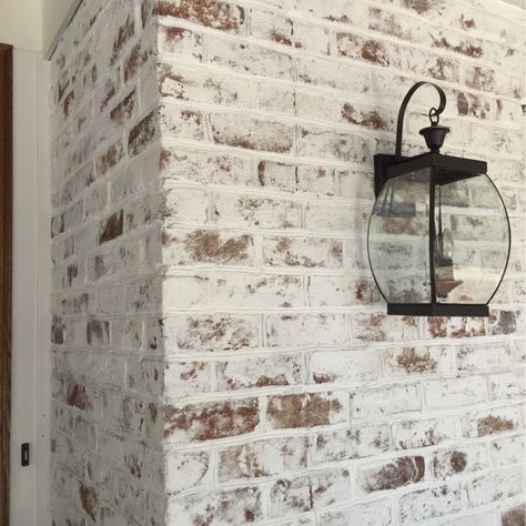 How To Whitewash A Brick Fireplace With Limewash German Smear Brick, Lime Wash Brick, Whitewash Brick, Painted Brick House, White Wash Brick, Christmas House Lights, Faux Brick Walls, Brick Fireplace Makeover, A Brick Wall