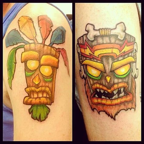 Aku Aku and Uka Uka Tattoo! Crash Bandicoot! Aku Aku Tattoo, Crash Bandicoot Mask Tattoo, Crash Bandicoot Tiki Mask, Nerd Tattoos, Crash Bandicoot Twinsanity, Crash Bandicoot Cross Stitch, Ooga Booga, Gamer Tattoos, Nerd Tattoo