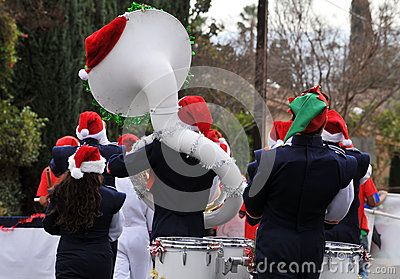 Back side of group of high school students marching down the street in a Christmas parade Christmas Parade, Band Music, Marching Band, Editorial Illustration, High Resolution Images, School Students, High School Students, Editorial Photography, Graphic Art