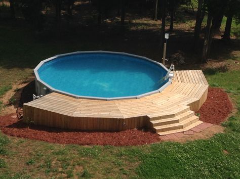 Above ground pool and deck. Half Sunk Above Ground Pool, Sloped Pool, Piscina Pallet, Oval Pool, Pool Deck Plans, Best Above Ground Pool, Swimming Pool Decks, Above Ground Pools, Above Ground Pool Ideas