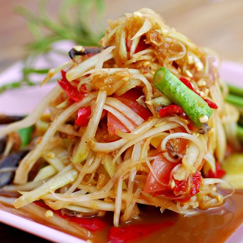 Tum mak hoong is a popular Lao dish that is fast becoming well known around the world for its unique spiciness and flavor. The term “tum” in Laos means to “smash and mix” which is why it is prepared in a Laos Style Mortar and Pestle.        Product Featured in this Recipe            Loas Style Mortar Papaya Salad Laos, Green Papaya Salad, Cambodian Food, Laos Food, Crunchy Salad, Thailand Food, Papaya Salad, Asian Dishes, Food Presentation