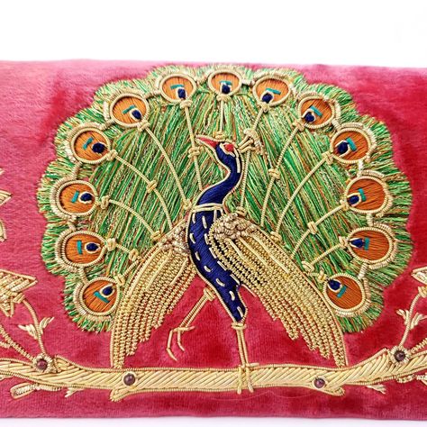 "Stunning glittery peacock embroidery on peachy red crushed velvet evening clutch bag, using silk, metallic gold tone threads and genuine semi precious stones. Dazzling goldwork on the tail and glittery wings! Such lavish details! You will certainly stand out and be noticed wearing this purse. Perfect gift for a peacock lover! Expertly hand embroidered by zardozi artisans. Our aim is the preservation of the zardozi art form. Zardozi means \"gold thread\" or \"writing with gold\". It is an elabor Peacock Clutch, Bird Purse, Peacock Embroidery, Embellished Purses, Wedding Purse, Beaded Belt, Gold Work, Gold Thread, Gold Threads