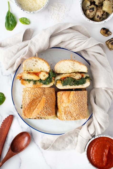 You've had an eggplant or chicken parm sandwich, but what about a spinach and artichoke parm sandwich? This dish from chef and recipe developer Patterson Watkins offers a delicious take on an Italian-American classic. #spinach #artichoke #parmesan #sandwich Eggplant Chicken Parmesan, Chicken Parm Sandwich, Parmesan Sandwich, Chicken Parmesan Sandwich, Seasoned Butter, Chicken Parm, Artichoke Hearts, Frozen Spinach, Spinach Artichoke