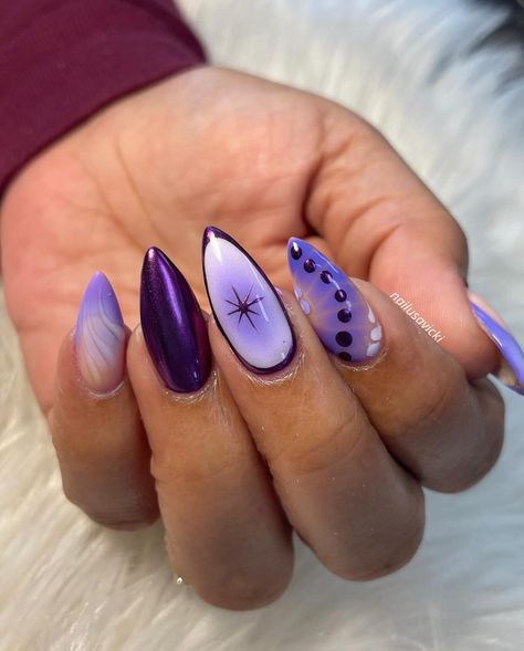 Out with the blue, in with the purple💜 . . . #nails #nailusa #nailart #naildesign #nailsofInstagram #naildesigns #nailsoftheday #naildesignsideas #acrylic #acrylicnails #raleigh #durham #raleighnails #trend #trendynails #winternails Purple Fall Nails 2024, Almond Nails Dark Purple, Dark Purple And White Nails, Purple And Teal Nails Designs, Lilac And Blue Nails, Cat Eye Gel Nail Designs, Purple Abstract Nails, Deep Purple Nails Design, Lilac Nail Ideas