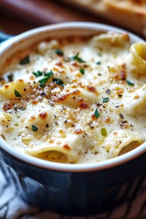 Get ready for a cozy night in with this Creamy Alfredo Lasagna Soup! 🍜✨

This soup combines all the comforting flavors of lasagna into a creamy, delicious dish that's perfect for any night of the week. It’s hearty, easy to make, and absolutely delightful! Let’s get cooking!

Here’s what you’ll need:

- 1/2 lb ground sausage
- 1 small onion, chopped
- 8 oz mushrooms, sliced
- 2 cloves garlic, minced
- 4 cups chicken or vegetable broth
- 8 oz lasagna noodles, broken into pieces
- 1 cup heavy cream
- 1 cup grated Parmesan cheese
- 1 tsp Italian seasoning
- Salt and pepper to taste
- Fresh parsley, chopped (for garnish)

Instructions:

1. In a large pot, brown the ground sausage over medium heat unt 🥣❤️ 

#lasagnasoup #comfortfood #creamygoodness #souplovers #dinnerdelight Alfredo Lasagna Soup, Alfredo Lasagna, Viral Food, Lasagna Noodles, Seasoning Salt, Ground Sausage, Lasagna Soup, Vegetable Broth, No Noodle Lasagna