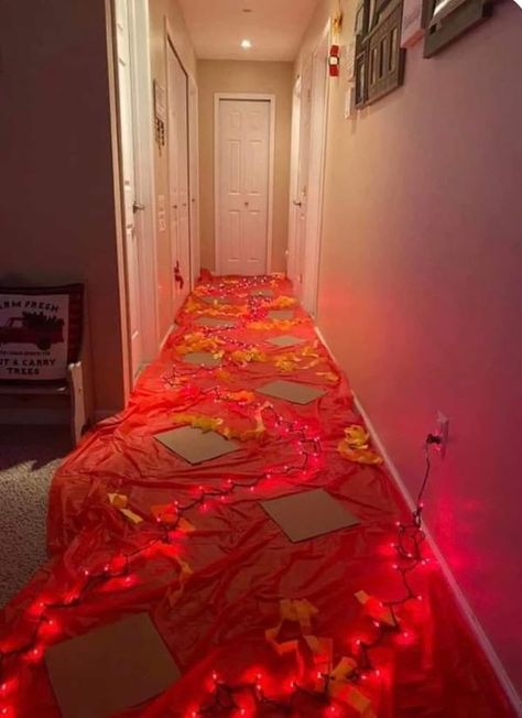 Homemaking Tips | A little $2 tissue paper,  and some Christmas lights really bring the floor is lava to life 🌋👏🏼 | Facebook Elf Ideas Easy, Floor Is Lava, The Floor Is Lava, Elf Magic, Awesome Elf On The Shelf Ideas, Elf Activities, Xmas Elf, Elf Antics, Elf Fun