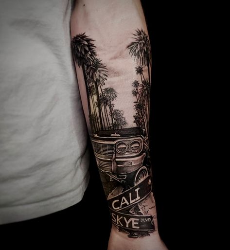 Tattoo done by Jason Vickers ig-@jason_vickers_tattoo Forearm tattoo, car, palm trees, california, low rider, impala, street sign, road sign #tattoo #tatted #ink #cai Hollywood Sleeve Tattoo, California Palm Trees Tattoo, California Tattoo Ideas Men, California Theme Tattoo, California Sleeve Tattoo Ideas, Road Sign Tattoo Ideas, Socal Tattoo Ideas, Realistic Car Tattoo, California Leg Sleeve Tattoo