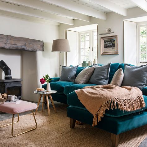 Have a wander through this 400-year-old thatched cottage in the Cornwall countryside Cornwall Countryside, Accommodation Design, Teal Cottage, Teal Sofa Living Room, Turquoise Couch, Cottages Interiors, Rock Cottage, Teal Furniture, Teal Couch