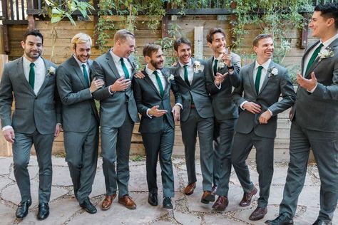 A Romantic Forest Inspired Wedding at the 1909, groom and groomsmen in dark grey suits with green ties Groom Suit For Green Wedding, Grey Suits With Green Ties, Groom Suites Wedding Grey, Dark Grey Groomsmen Suits Green Tie, Gray And Green Groomsmen Attire, Forest Green And Gray Wedding, Groomsmen Attire Forest Wedding, Green Tie Wedding Groomsmen, Groomsmen Dark Green Tie