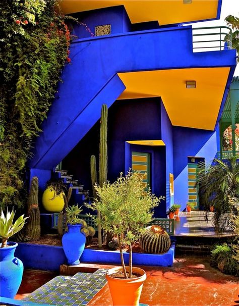 garden in Marrakesh, Morocco - owned by Yves Saint Laurent and Pierre Berge Blue And Yellow House, Marrakesh Morocco, Yellow House, Casas Coloniales, Casa Exterior, Real Estate Humor, Real Estate Quotes, Art Deco Architecture, Moroccan Design