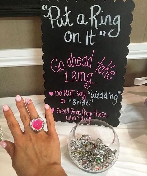 steal ring bridal shower game idea! Place fake diamond rings or faux cocktail rings in a bowl for guests to take. If they say bride, wedding, Engagement Party Activities, Diy Bridal Shower Games, Engagement Party Ideas, Disney Bachelorette, Engagement Photos Ideas, Disney Bridal Showers, Fun Bridal Shower Games, Heart Engagement, Bridal Shower Diy