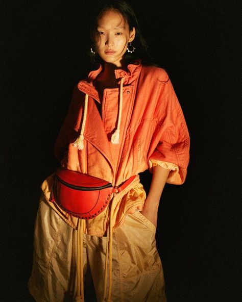 ISABEL MARANT on Instagram: “Blazing colors create sunset hues. @yoonmi.sun wears the SKANO bag and CONIA earrings from the #IsabelMarantSS22 collection, photographed…” Sunset Hues, Summer 2022, Isabel Marant, Fashion Inspo Outfits, Link In Bio, Tap, Lookbook, Fashion Inspo, Instagram Profile