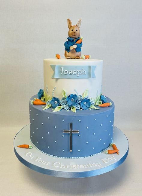 2 tier Peter Rabbit, shades of blue Christening cake - a favourite of our designs, this version with an added cross on the front of the bottom tier Cake 2 Tier, Christening Cake, Fancy Cakes, Beatrix Potter, Peter Rabbit, Christening, Shades Of Blue, 1st Birthday, Birthday Cake