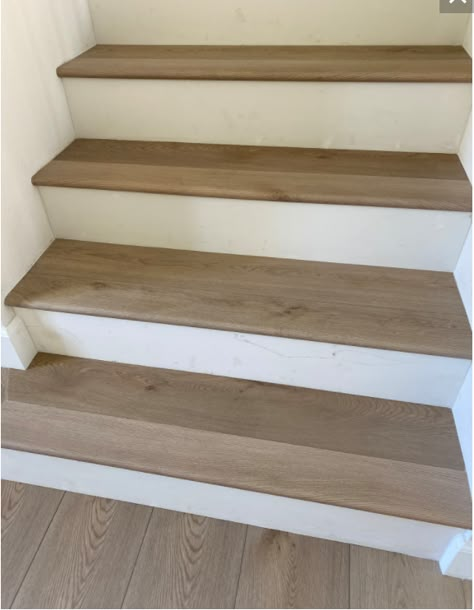 Light Stained Stairs, Wooden Floor On Stairs, Stair Flooring Ideas, Paradigm Tower, Lvp Stairs, Stairs Flooring, Laminate Flooring On Stairs, Laminate Stairs, Timber Floor