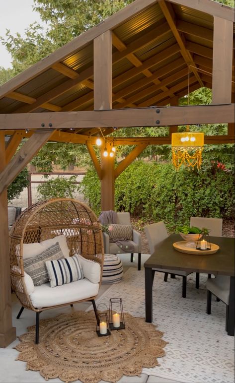 Gazebo With Table And Chairs, Pergola With Egg Chair, Gazebo And Dining Table, Outdoor Jute Rug Patio Ideas, Egg Chair Decoration Ideas Patio, Boho Gazebo Ideas, Outdoor Egg Chair Patio, Round Outdoor Rug Patio Ideas, Outdoor Gazebo Ideas Decor