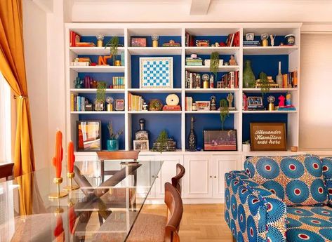 #MaximalistLivingRoom #MaximalistInterior #ColorfulRooms #MyDomaine Shelves Around Tv, Colorful Bookshelf, Maximalist Living Room, Bookcase Ideas, Home Library Rooms, Glam House, Family Room Inspiration, Shelf Decor Living Room, Maximalist Interior