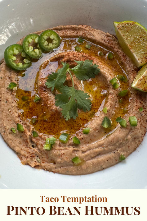 This Taco Temptation Pinto Bean Hummus is one of our new favorites! It’s a creamy blend of pinto beans, tahini, cilantro, jalapeños, lime juice, and our brand-new seasoning blend! It’s a great side dish for tacos, enchiladas, or a fun dip for your next party! 🌮 It's a bold and vibrant dip that combines creamy, earthy pinto beans with the fresh, zesty flavors of cilantro and jalapeño. The result is a flavorful and satisfying spread with a perfect balance of heat, tanginess, and richness. Refried Beans From Scratch, Vegan Refried Beans, Beans From Scratch, Make Refried Beans, Taco Side Dishes, Homemade Refried Beans, Refried Beans Recipe, Pinto Bean, Vegan Side Dishes