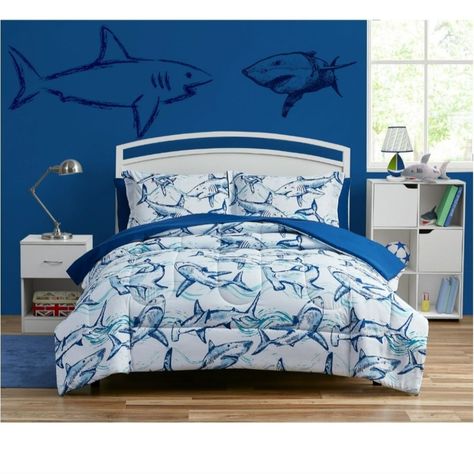 When It’s Bedtime For A Fierce Swimmer, Choose The Your Zone Shark 7-Piece Bed In A Bag To Snuggle Up In. The 7-Piece Set Comes Complete With A Comforter, A Fitted Sheet, A Flat Sheet, Two Pillowcases, And Two Shams. This Sharp Pattern Showcases Crosshatch Illustrations Of The Ocean’s Apex Predator On Microfiber Fabric That Kids Will Find Soft And Snuggly. When It’s Time To Throw It In The Washing Machine, Simply Wash It Cold In Like Colors And Let It Tumble Dry Low Before You Shake It Out And M Kids Shark Room, Shark Toddler Room, Boys Shark Bedroom, Shark Room For Boys, Shark Bedroom Ideas, Shark Bedroom Ideas For Kids, Shark Boys Room, Shark Room Decor, Shark Themed Bedroom