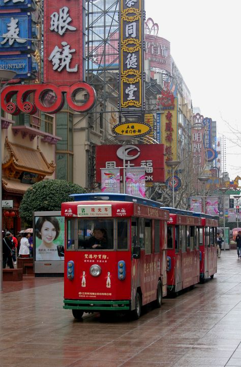 A tram on Nanjing Road Pedestrian Street, Shanghai, China.  #china #shanghai #nanjingroad China Street Aesthetic, Transport Photography, 2023 Lifestyle, Cyberpunk Street, Chinese Scenery, Nanjing China, China Street, China Shanghai, The Bund