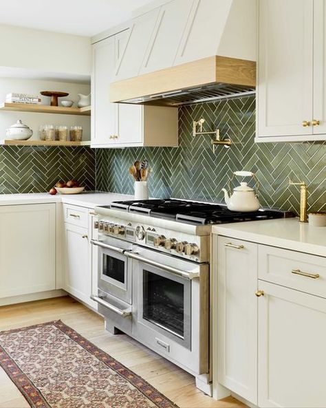 kitchen, cream cabinets with cream marble countertop, green tile backsplash, floor runner, stainless steel oven, gold hardware Green Backsplash, Interior Dapur, Herringbone Backsplash, Kabinet Dapur, White Kitchen Decor, Beige Kitchen, Gold Kitchen, Green Tile, Kitchen Inspiration Design