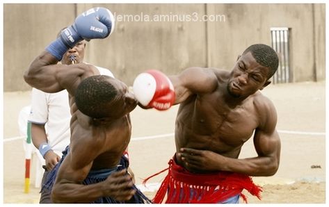 Dambe is a very long traditional game in Nother part of Nigeria, it a game where winner takes all, it could be staged to get wife and for fun. Now, the game has turn professional like boxing, where proffesional Dambe boxers demand for fees before fithing and even incoporated in the calender of  National Sports Festival who modernise the game.It's attraction is the root of the game,  no medical officials,Juju and hard drugs is commonly used, no timing,idea is to inflict heavy injury. Sports Festival, Traditional Game, Anatomy Practice, Lagos Nigeria, Combat Sports, Martial Art, Traditional Games, Street Photographers, Action Poses