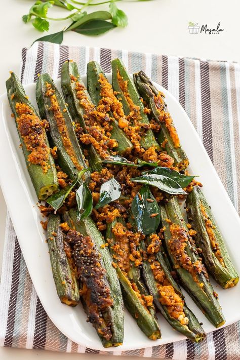 Stuffed Okra Recipe - Stuffed Bhindi Fry | Bharwa Bhindi - Masalakorb Bharwa Bhindi, Stuffed Okra, Bhindi Fry, Okra Recipe, Coconut Ginger, Okra Recipes, Dried Mangoes, Food Words, Coriander Seeds