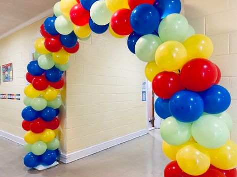 Red, yellow, green, and blue striped balloon arch for a mission youth camp Youth Camp, Blue Balloons, Stage Design, Balloon Arch, Green And Blue, Red Yellow, Arch, Balloons, Yellow