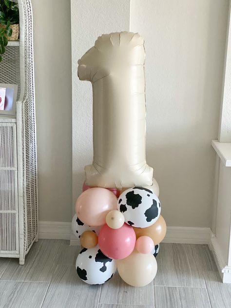 Welcome to Oh How Charming! Looking to make a statement at your next party? A balloon tower is the way to go! This will definitely make your guests say WOW!  The tower is the perfect accent to any event, use is at the party entrance, next to a high chair, cake table..the possibilities are endless! Each kit includes everything needed to create your very own balloon column. I know it looks intimidating, but no balloon experience is required!  And NO HELIUM is used, this is created using air only!! Cow Print Balloon Column, Two Rowdy Birthday, Pink And Cow Print Balloon Arch, First Rodeo Birthday Favors, Wild West Balloon Garland, First Rodeo Balloon Arch, First Rodeo Birthday Table Decor, Cowgirl Toddler Birthday Party, Girly Farm Birthday Party