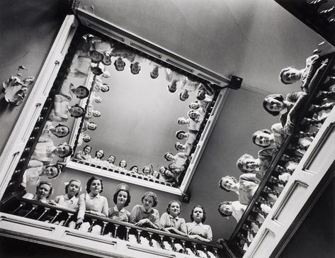 Nurses hanging over railing of spiral stairs Roosevelt Hospital; nurses Photos Black And White, Alfred Eisenstaedt, Hospital Photos, Black And White, Photography, White, Black