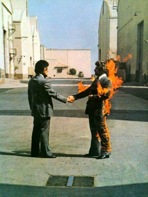 Storm Thorgerson's Artwork from Pink Floyd's Wish You Were Here Wish You Were Here Aesthetic, Pink Floyd Wallpaper, Storm Thorgerson, Soldier Drawing, Hard Photo, Fire Cover, Fashion Week Inspiration, Pink Floyd Art, Richard Williams