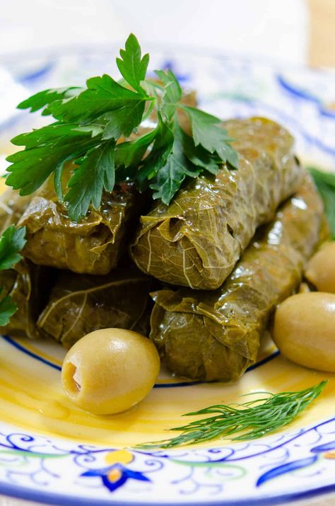 Stuffed Grape Leaves with Ground Beef, Lemon, Fresh Herbs, and Rice #dolma #dolmades #stuffedgrapeleaves #appetizer #recipe Dolmas Recipe, Beef Main Dishes, Stuffed Grape Leaves Recipe, Greek Dolmades, Dolmades Recipe, Dolma Recipe, Grape Leaves Recipe, Office Food, Gourmet Appetizers