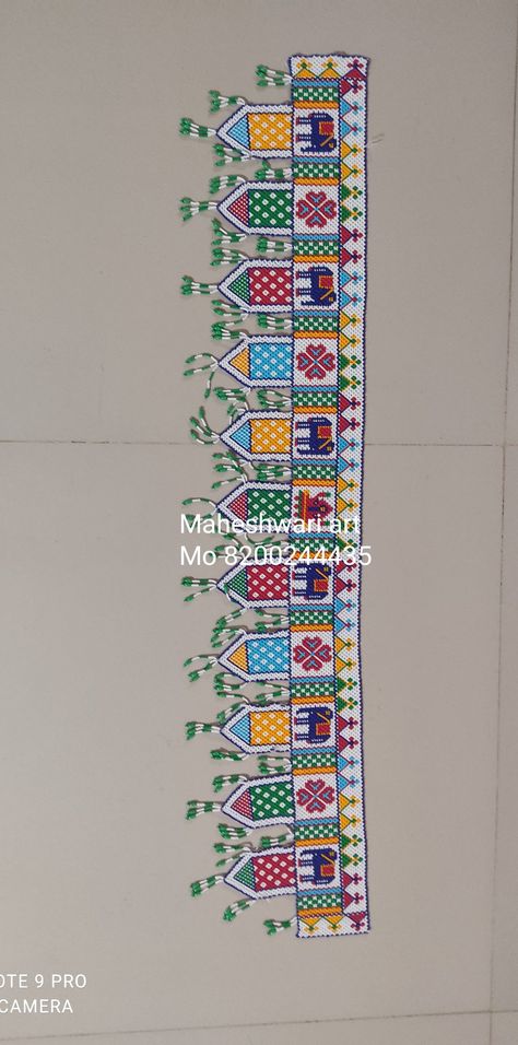 For more details follow my instagram id maheshwari art and craft Hathi Goti Hand Work Toran, Moti Work Toran, Moti Toran Design, Rumal Design, Bavariya Work, Moti Toran, Toran Designs, Kalash Decoration, Kutch Work Designs