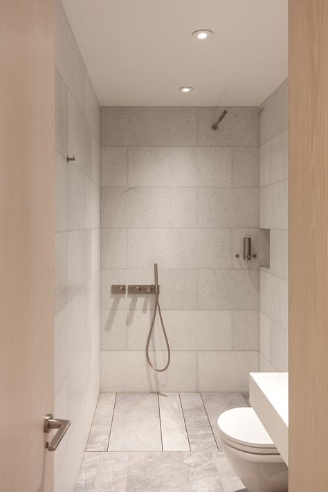 The new bathroom design is the complete opposite, with oversized blocks of white stone and an open shower stall. Simple Bathroom Renovation, New Bathroom Designs, Open Showers, Mold In Bathroom, Wet Room, Small Toilet, Steam Showers Bathroom, Small Bathroom Storage, Upstairs Bathrooms