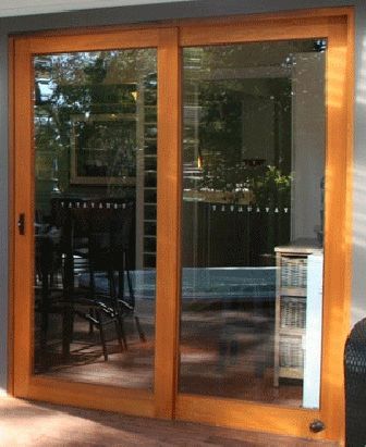 Wood slide Wood Patio Doors, Rustic Countertops, External Sliding Doors, Timber Sliding Doors, Cedar Door, House Tweaking, Double French Doors, Marketing Products, Timber Door