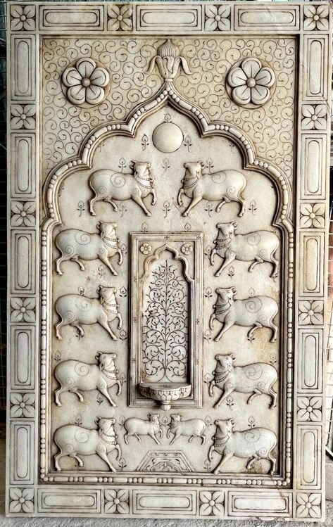 Luxury Carved Nandi Fountain, Garden Decor, Water Fountain, Nandi Designed Outdoor Fountain, Mughal Style Wall Art, Rustic Wall Fountain Length: 121.9cm / 48inch. Width: 76.2cm / 30inch. Height: 3.81cm / 1.5inch. The Rustic Finish White Marble Nandi Work is beautifully hand-carved and features many intricate patterns. The handcrafted Rustic Finish White Marble Fountain makes a focal point in your space.  Moroccan mosaic fountains are beautiful and intricately designed water features that are commonly found in Moroccan architecture and design. These fountains are often handcrafted using traditional techniques and materials and can be used both indoors and outdoors as a decorative and functional piece. In addition to their aesthetic appeal, Moroccan mosaic fountains also provide a relaxing a Mosaic Fountain, Fountain Art, Marble Fountain, Wall Art Luxury, Fountain Garden, Wall Carvings, Marble Carving, Resort Lifestyle, Water Fountains Outdoor