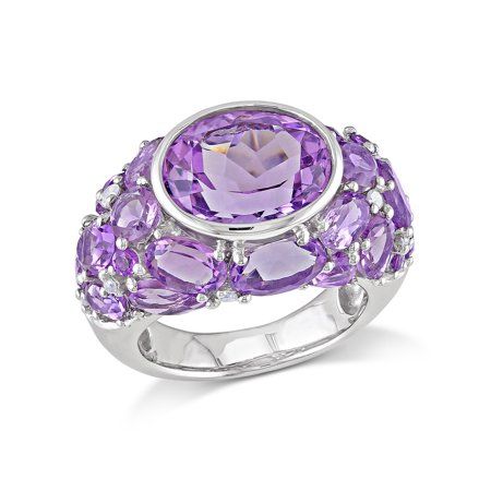 Adorn your finger with this fascinating Tangelo Amethyst and Diamond Cluster Cocktail Ring. Crafted in sparkling sterling silver, this ring features 25 multi-shape, prong and bezel-set shimmering amethyst gemstones (12 x 10mm) clustered around the ring and embellished by 10 round-cut, prong-set twinkling diamonds (G-H, I3) resting in a unique pattern. Enhanced with a high-polish finish, this ring makes a valuable addition to any jewelry collection. Liven up your outfit with this gorgeous gemston Fashion Rings Silver, Antique Jewelry Rings, Silver Cocktail, Engagement Ring White Gold, Diamond Cluster Ring, 2 Carat, Diamond Cluster, Amethyst Ring, White Ring