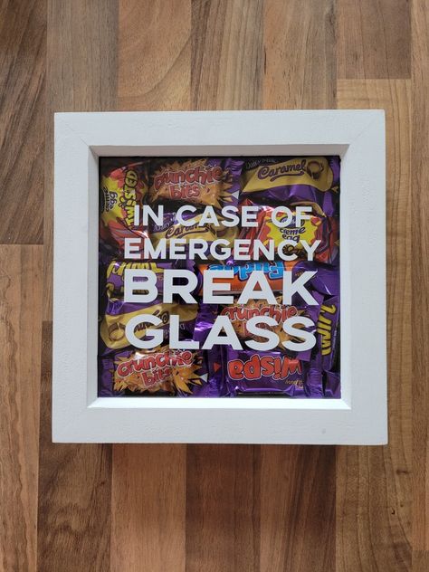 Novelty Christmas frames now available with text "IN CASE OF EMERGENCY BREAK GLASS". Frame in the ad contains Heroes chocolate. Frames are available from my Etsy page and can be filled with a variety of chocolates or sweets depending on the frame depth. Frame measures approximately 18cm x 18cm Emergency Chocolate, Christmas Presents For Moms, Diy Gifts For Girlfriend, Diy Gifts To Make, Best Friend Christmas Gifts, Homemade Holiday Gifts, Diy Gifts For Men, Diy Gifts For Dad