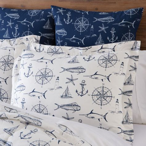 Accent your bedspread with this nautical inspired printed Captain Quarters Sham. Featuring navy blue and white nautical design icons, this stylish sham will transform your entire room. Made from 100% high quality cotton, this sham has a button back closure with a fabric overlap for optimum coverage. The buttons are large, and color coordinated making this item as attractive from the back as it is from the front view. Captain Quarters, Captains Quarters, King Size Pillow Shams, Nautical Bedroom, King Pillow, Coastal Bedding, King Size Pillows, Park Designs, Nautical Design