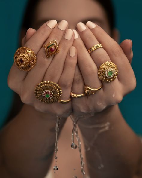 Enhance your charm with elegant brilliance, creating a mesmerizing tapestry of stacked gold jewellery. Traditional Rings Gold, Indian Rings Traditional, Indian Ring Designs, Big Rings Indian Gold, Indian Gold Rings, Indian Motif, Akshaya Tritiya, Antique Gold Rings, Wedding Ornaments