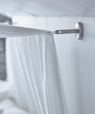 A close-up image of a curtain wire used to hang a canopy over a bed. Sloped Ceiling Bedroom, Beautiful Bed Designs, Curtain Wire, Ceiling Curtains, Cosy Bed, Slanted Ceiling, Fall Bedding, Kids Corner, Hanging Curtains