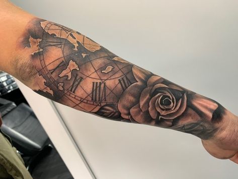 Clock, map & rose design forearm tattoo sleeve for men Black & grey Tattoo Ideas For Men Rose, Rose Forearm Tattoo Men, Rose Clock Tattoo, Clock Tattoo Design For Men, Forearm Tattoo Sleeve, African Sleeve Tattoo, Boston Tattoo, Rose Clock, Tattoos Arm