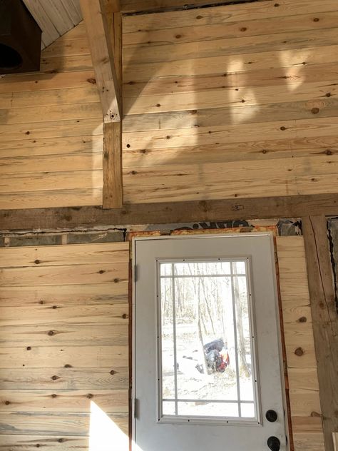 Cabin interior walls, exterior siding, and a very blue pond • The Vanderveen House T-111 Siding Interior Walls, Pine Walls Cabin, Pine Interior Cabin, Blue Pine Walls, Siding Interior Walls, Cabin Wall Colors, Barndo House, Cabin Walls, Knotty Pine Walls