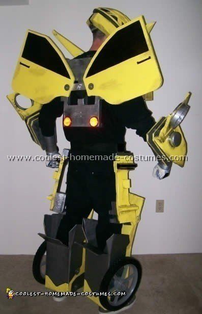 Transforming Transformers Bumble Bee Costume Diy Bumblebee Costume, Bumble Bee Transformer Costume, Bumble Bee Transformer, Optimus Prime Costume, Bumblebee Costume, Transformer Costume, Halloween Costume Inspiration, Bumble Bee Costume, Robot Costumes